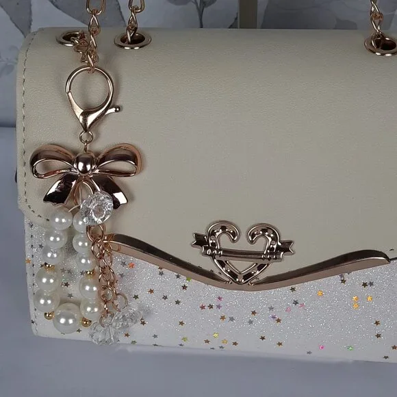 Like New White sparkle crossbody with detachable keychain charm nwot - Picture 5 of 6